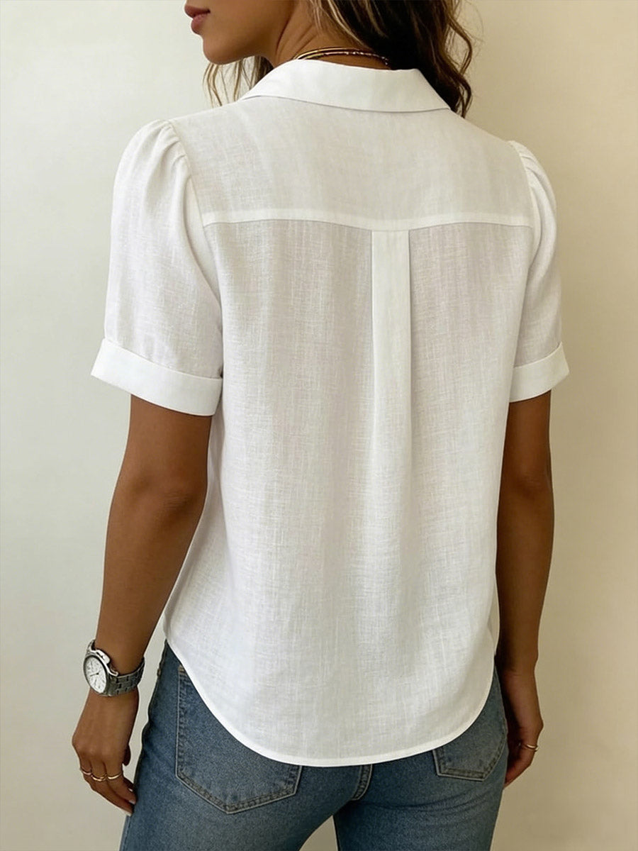 Crisp women's short-sleeve blouse. An effortless, lightweight top offering breezy comfort for daily wear.