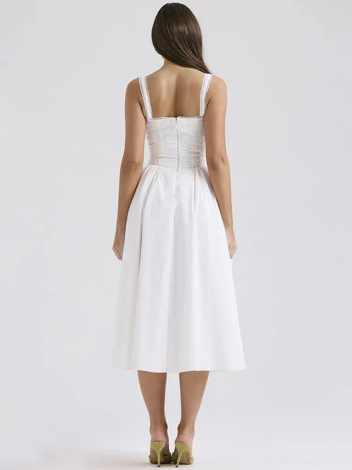Women's midi dress with ruffles & buttons. Lightweight, breezy summer fashion ideal for beach, vacation & casual style.