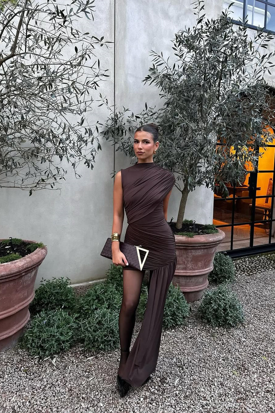 Brown asymmetric high neck bodycon mini dress for women, featuring elegant draping and ruched details.