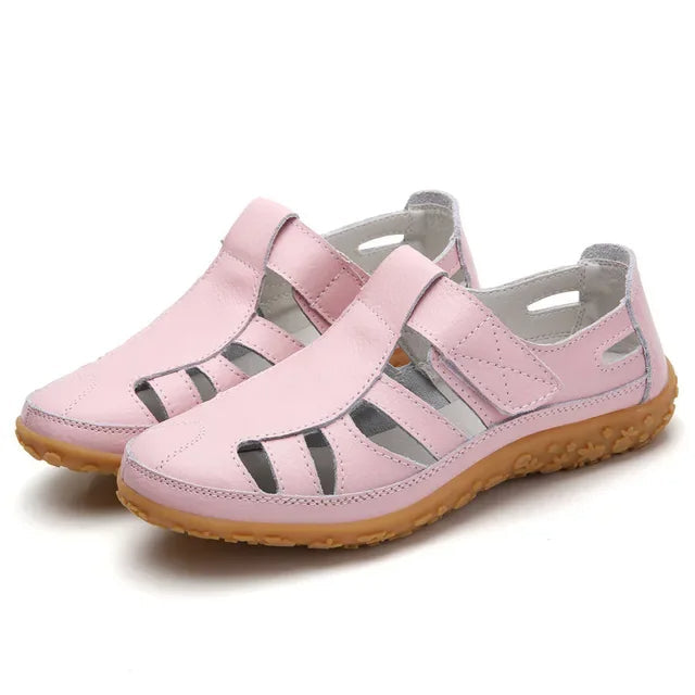 Beige leather comfort sandals for women, ideal for all-day wear.