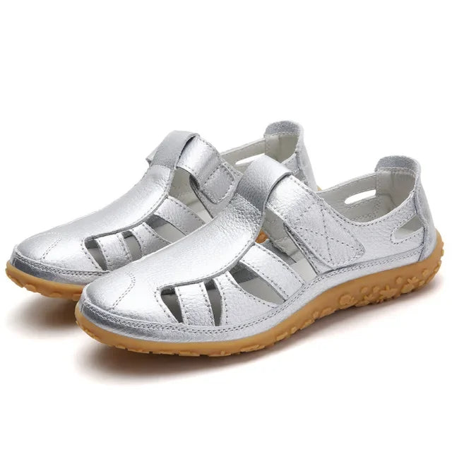 Classic design women's leather sandals with modern velcro fastening.