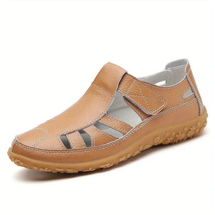 Adjustable velcro straps ensure perfect fit on these women's leather sandals.