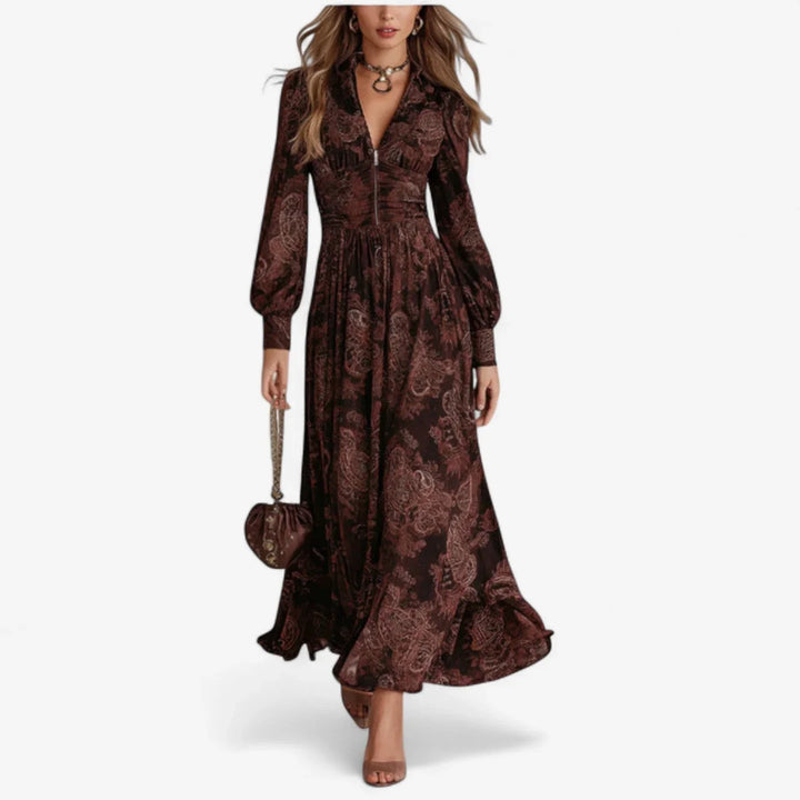 Women's brown paisley print maxi dress with collared v-neck and long balloon sleeves, ideal for boho chic style.