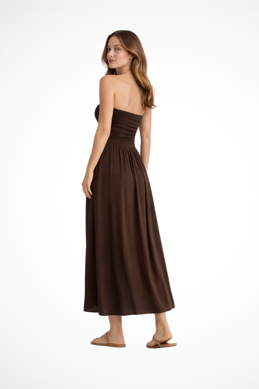 Elegant women's flowy brown strapless maxi dress with pleats, ideal for summer occasions & parties.
