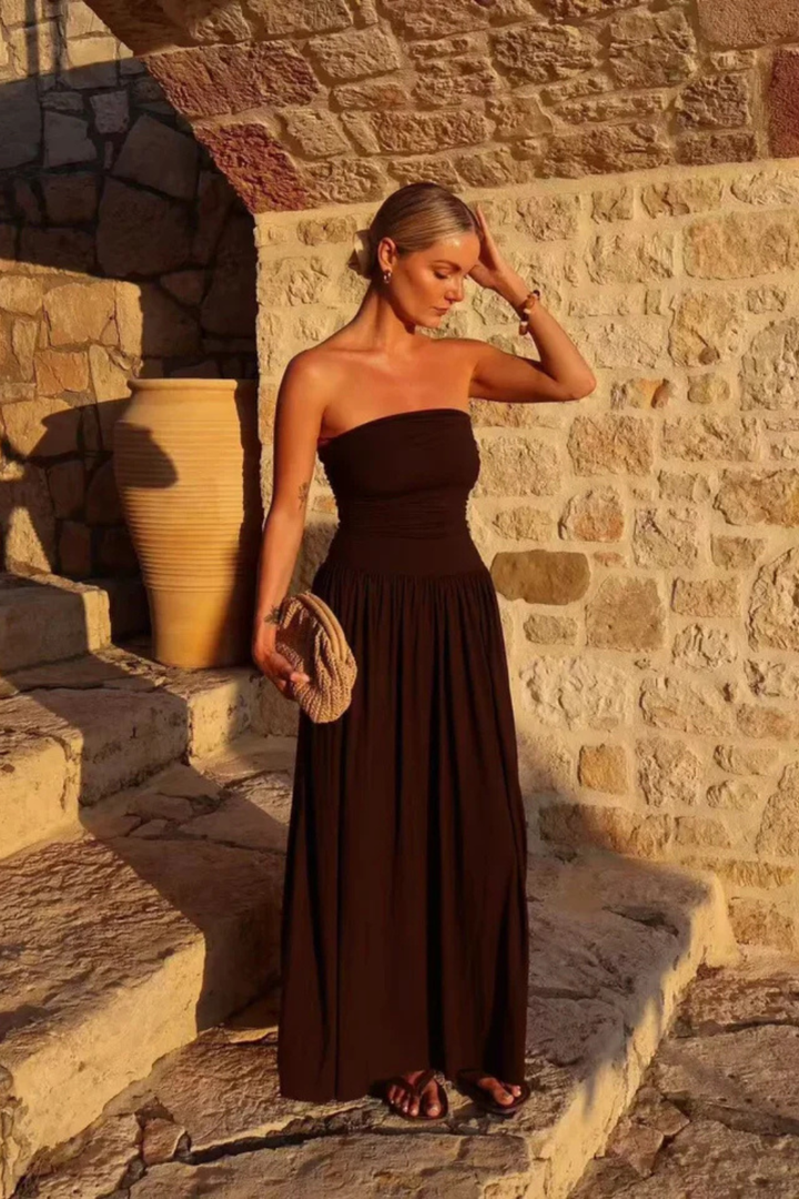 Women's brown strapless pleated maxi dress. Elegant long summer party & occasion wear.