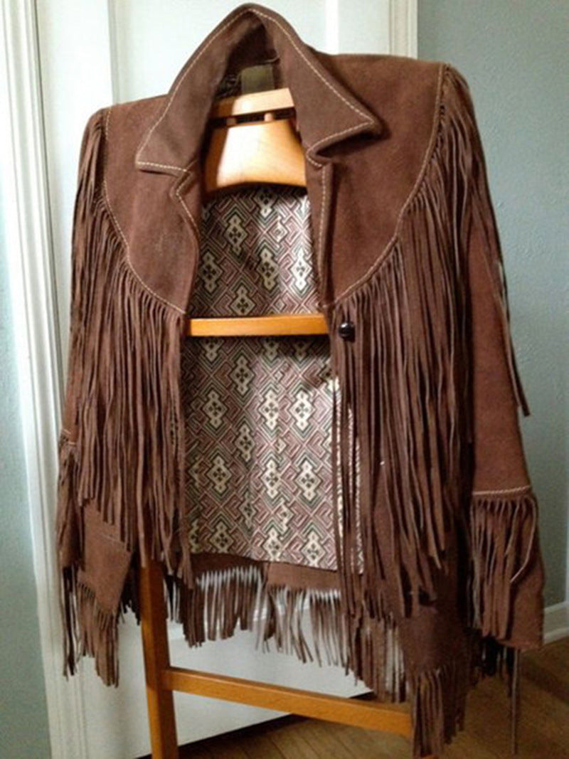 Back view of a women's fashion jacket showcasing unique suede fringe accents