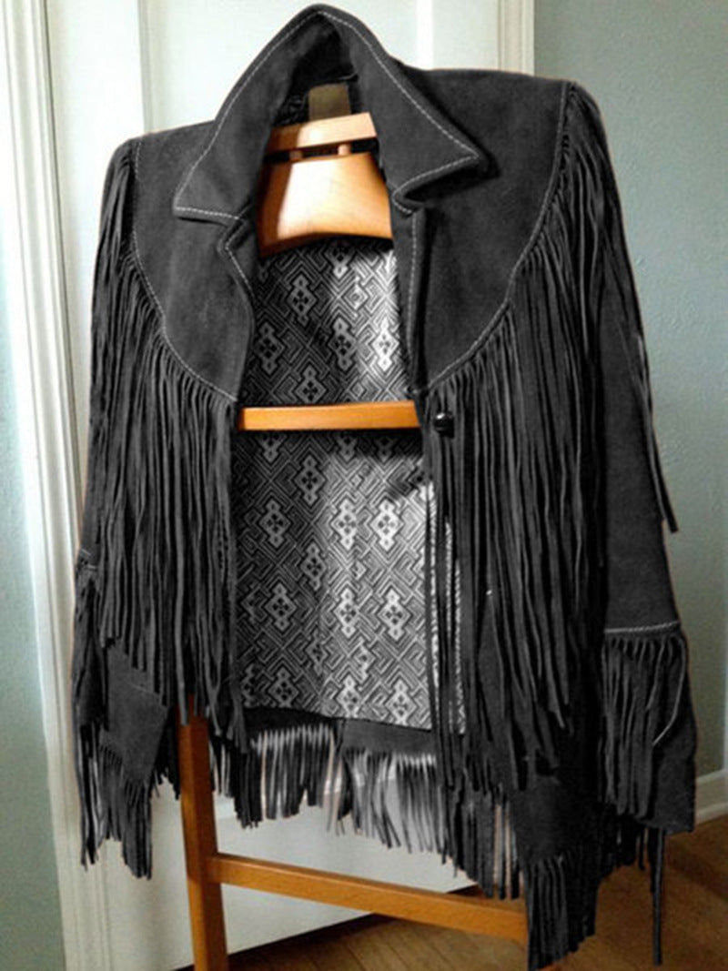 Detailed view of the soft suede material and stitching on a women's fringe jacket