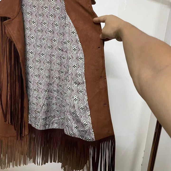 Model posing in a women's stylish fringe suede jacket, highlighting its comfortable silhouette