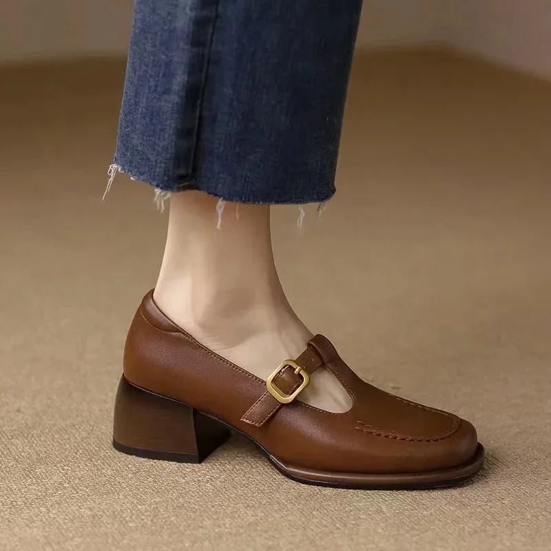 Textured brown T-Strap Mary Jane block heel shoes for women, combining classic style & lasting comfort.