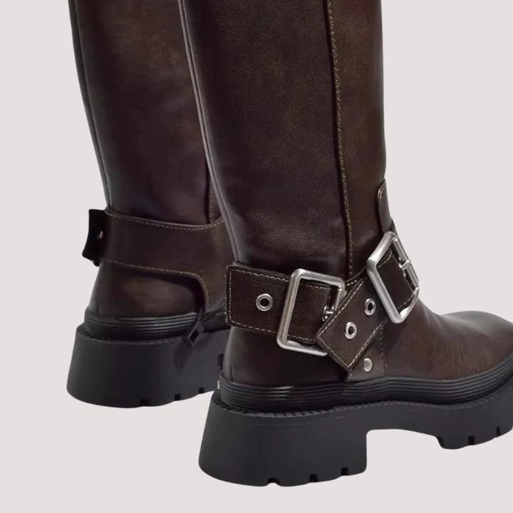 Fashionable ladies knee-high boots with adjustable buckle straps & sturdy chunky sole for ultimate style.