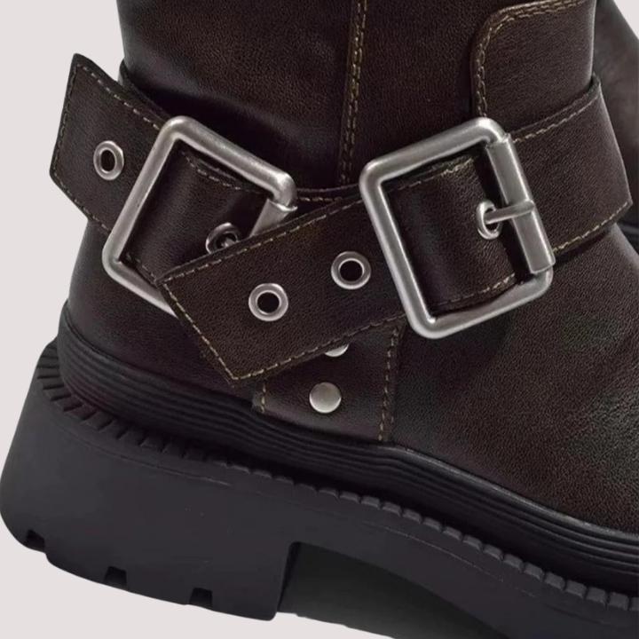 Stylish women's brown buckle knee-high boots, ideal for adding a chic and warm touch to any outfit.