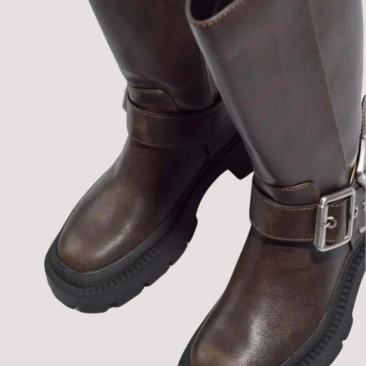 Classic women's knee-high winter boots with decorative buckles & a durable chunky sole for fashion-forward ladies.