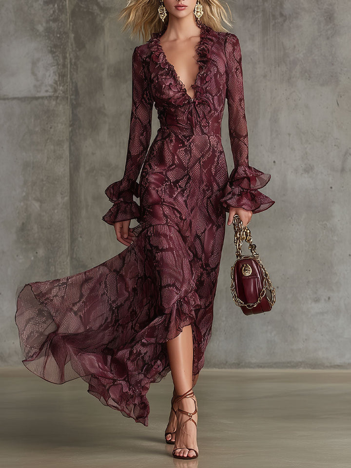 Women's burgundy snakeskin tiered maxi dress with ruffles & plunging neckline, perfect for occasion wear.