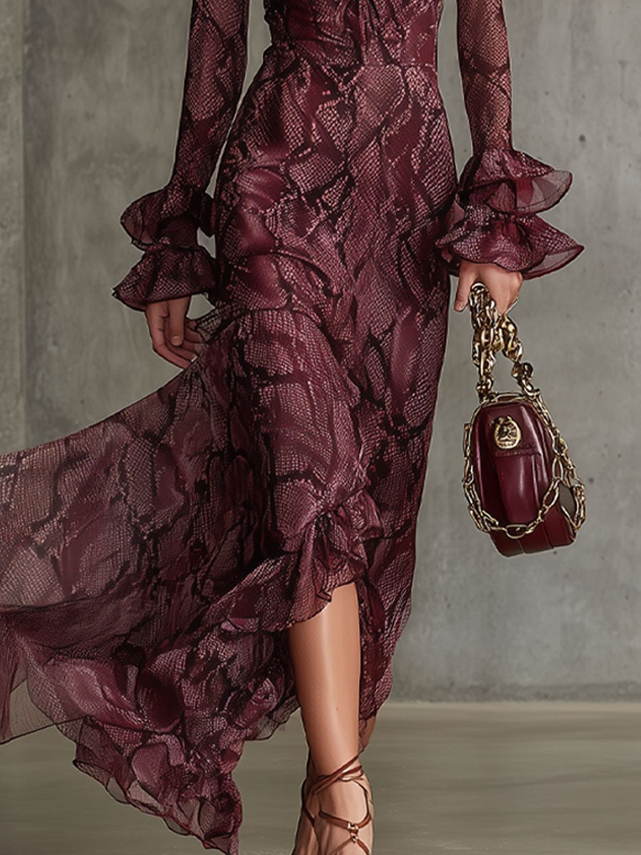 Fashionable women's snakeskin tiered maxi dress in burgundy. Ruffled details, flared skirt, ideal for parties.