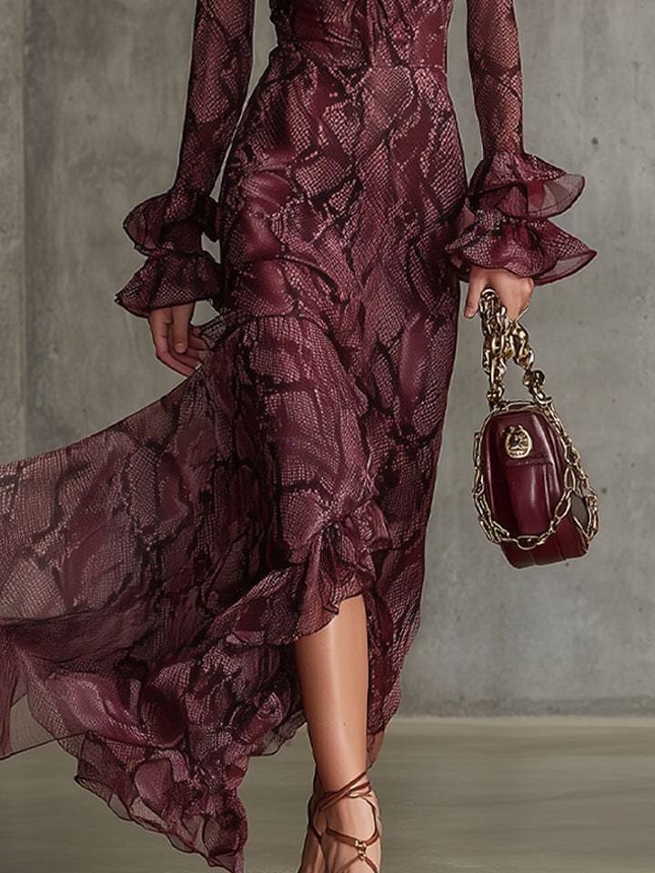 Fashionable women's snakeskin tiered maxi dress in burgundy. Ruffled details, flared skirt, ideal for parties.