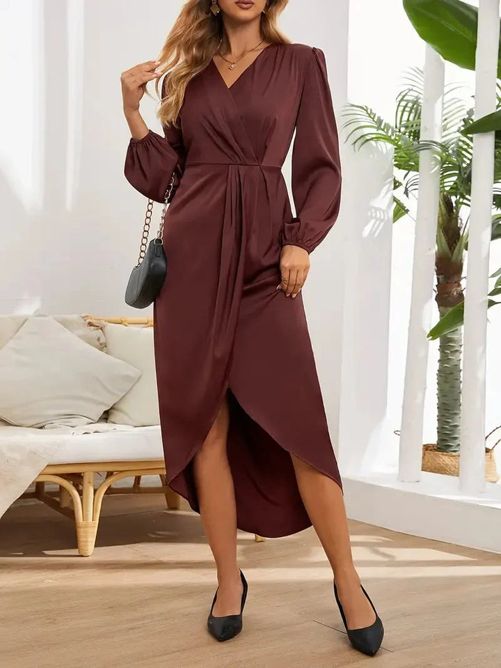 Elegant burgundy wrap midi dress for women, featuring a V-neck & long sleeves. Ideal formal or party dress.