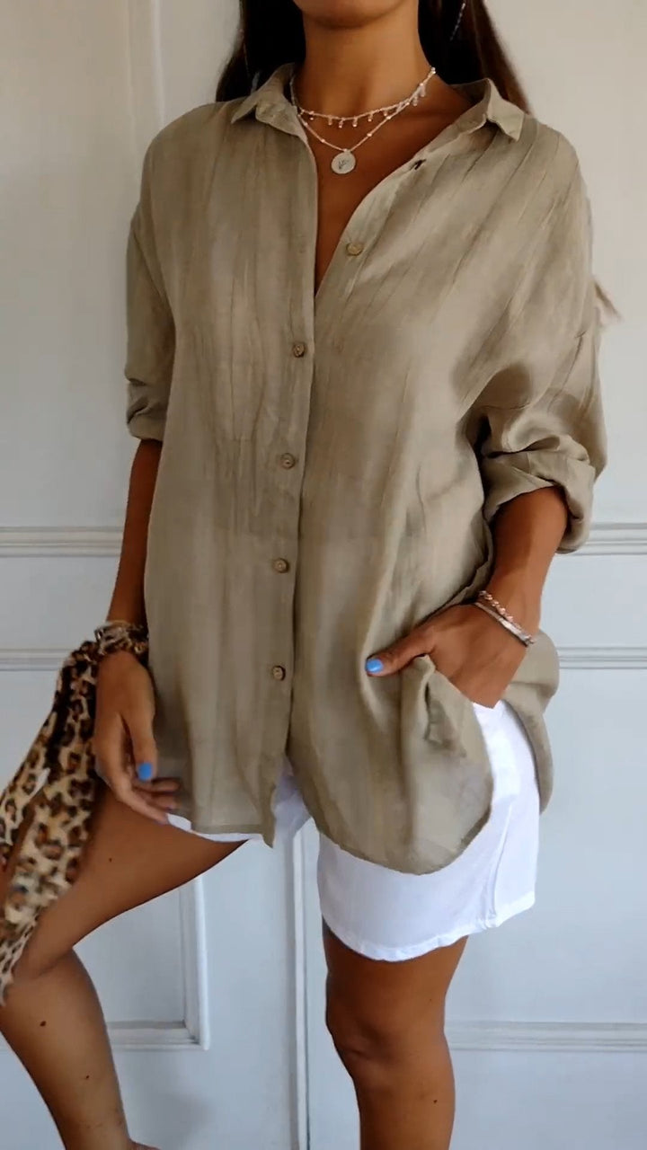 Elegant women's long sleeve button-down blouse, perfect for office wear or stylish casual outfits.