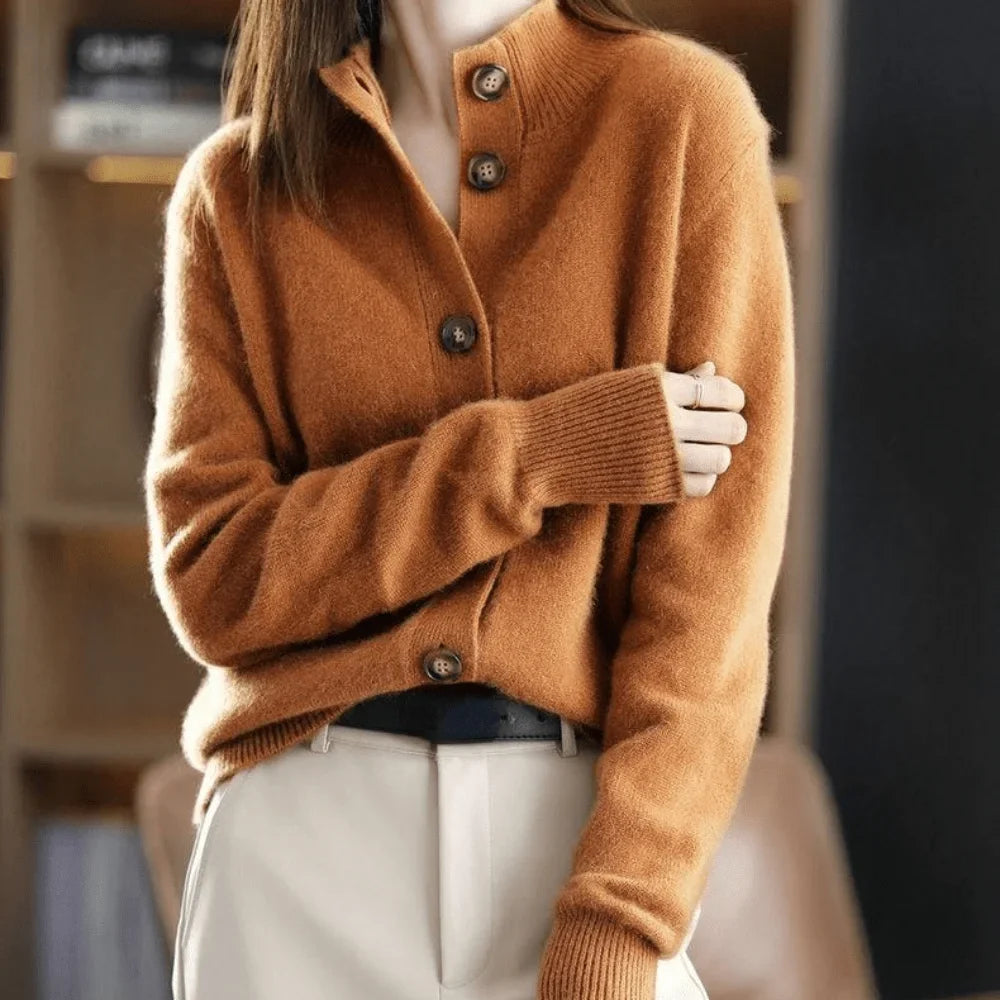 Women's button-front cardigan sweater with a stand-collar and stylish ribbed cuffs, perfect for layering.