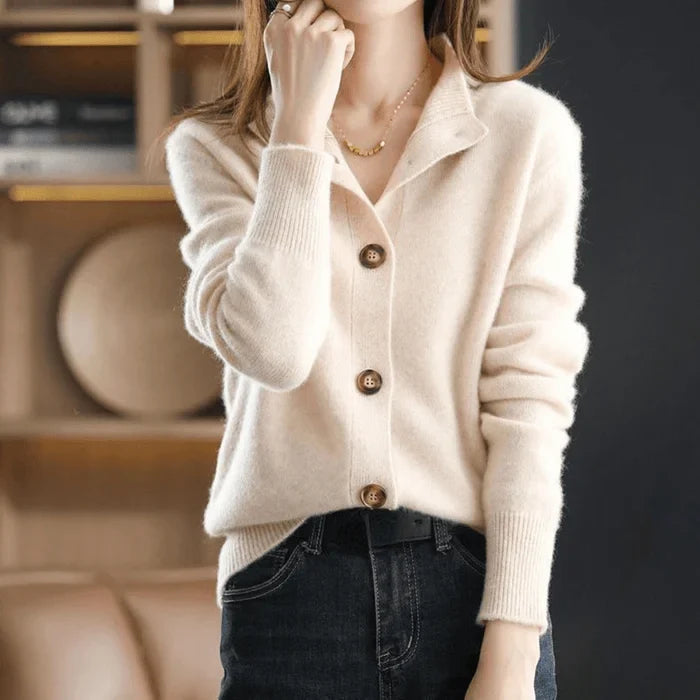 Elegant women's fashion cardigan, button-front, featuring a stand-collar and cozy ribbed cuffs for comfort.