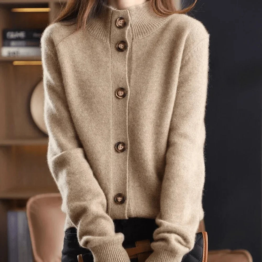 Fashionable women's knit cardigan, button-front, stand-collar, and ribbed cuffs for an elegant look.
