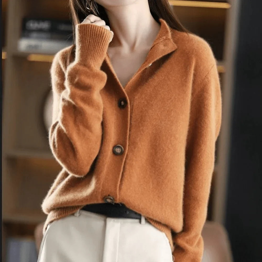 Comfortable women's button-front sweater, a practical cardigan with stand-collar and ribbed cuffs.