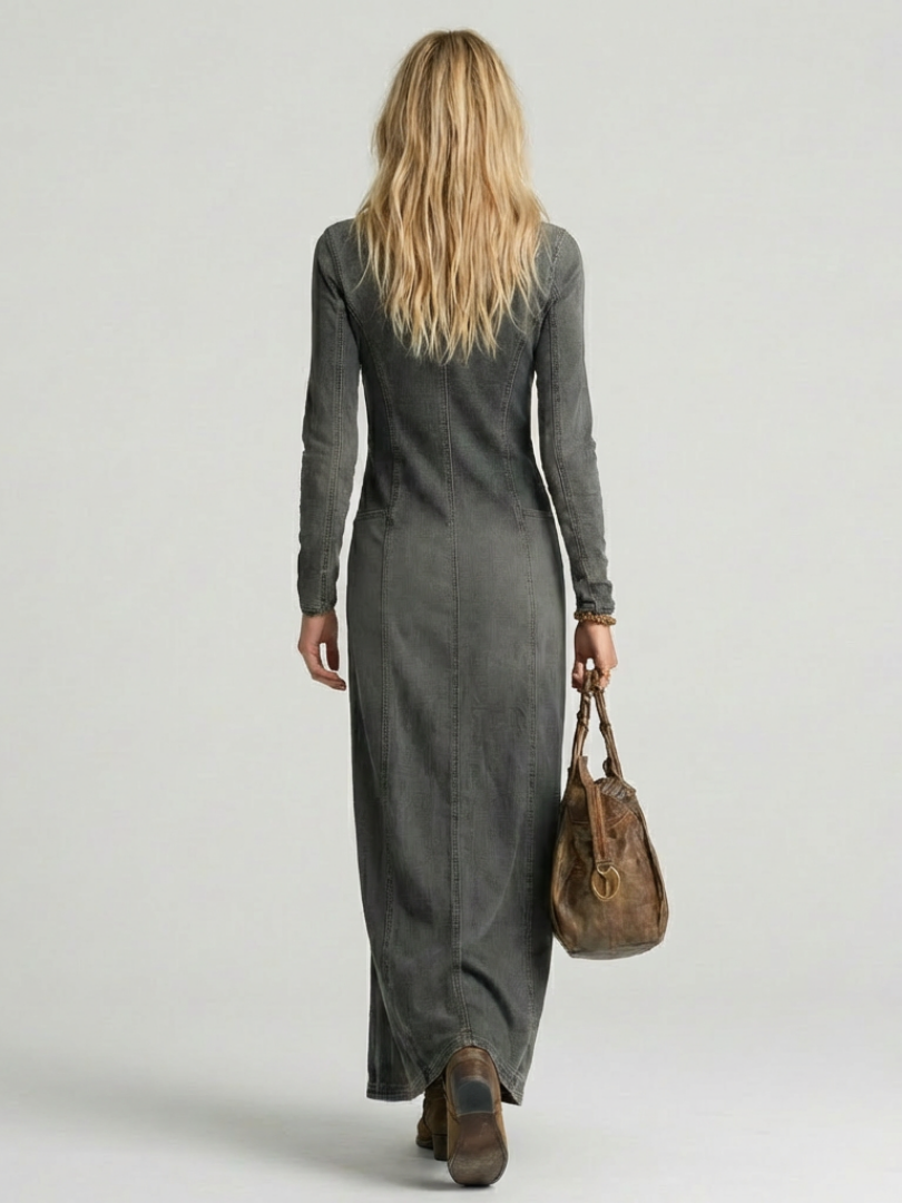 Woman wearing a stylish button-front denim maxi dress. Long sleeve, V-neck, comfortable, and versatile for everyday elegance.