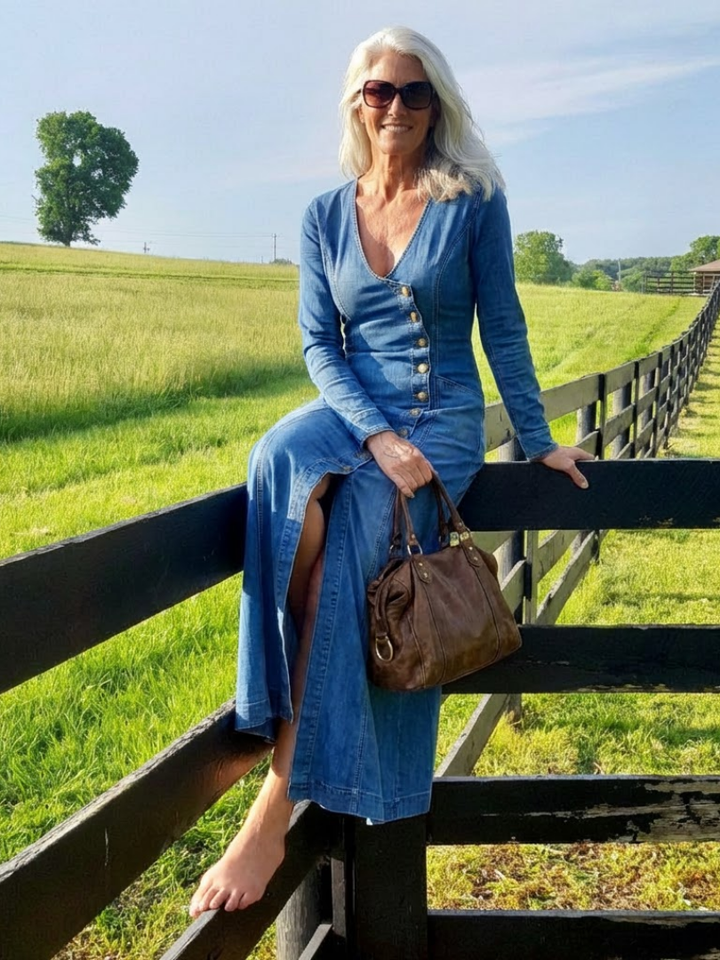 Blue denim button-front maxi dress. Women's long sleeve V-neck style, comfortable and elegant for versatile casual wear.
