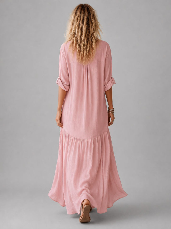 Pink button front maxi shirt dress for women. Stylish long casual dress, ideal for summer fashion.