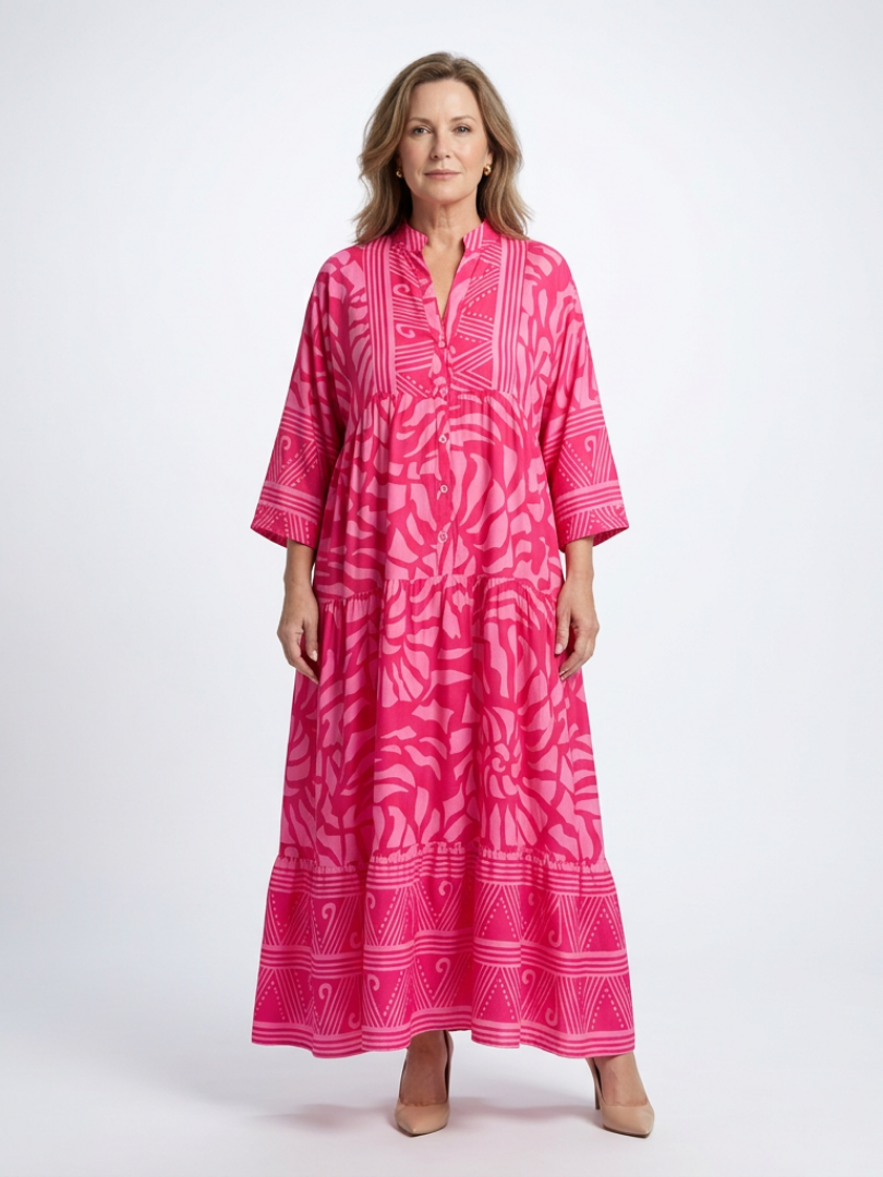 Women's button-front midi dress in a relaxed fit. Perfect for effortless summer style & everyday comfort.