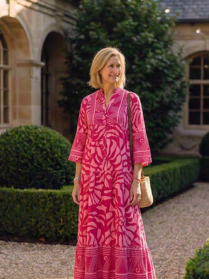 Stylish women's travel fashion midi dress with a comfortable relaxed fit, button front & elbow sleeves.