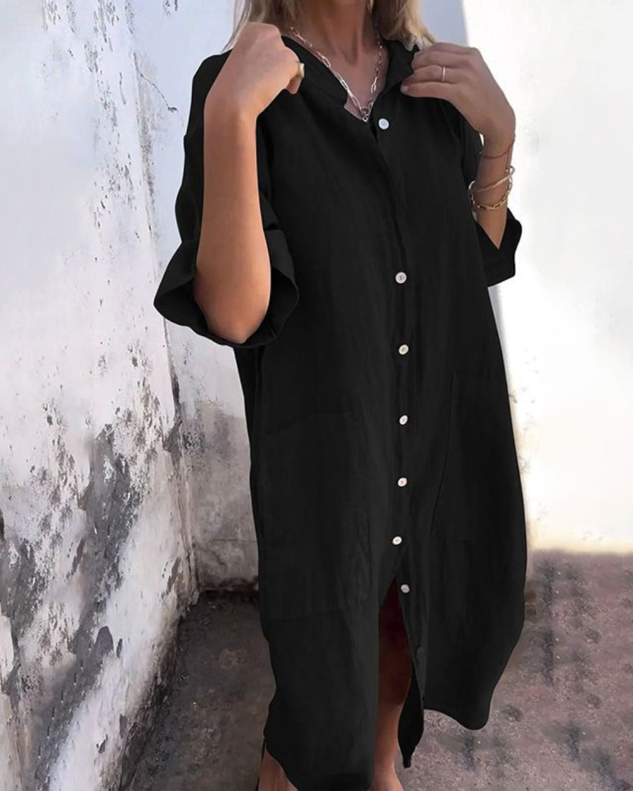 Casual women's button-front shirt dress with pockets, short sleeves, perfect for relaxed summer days.