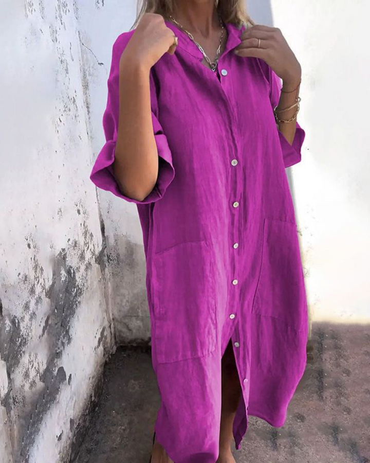 Comfortable women's v-neck button-front shirt dress with pockets, short sleeves, an essential summer piece.