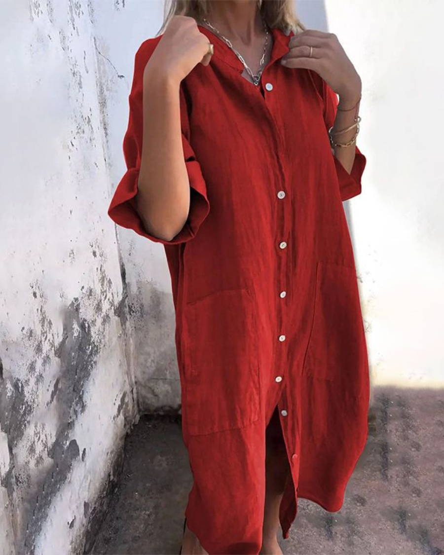 Chic women's button-front shirt dress with practical pockets, relaxed fit, short sleeves, great for casual style.