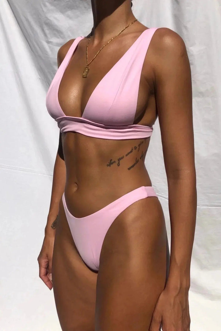 Stylish Calyra push-up bikini top and matching bottom, supportive swimwear for women's summer vacation.