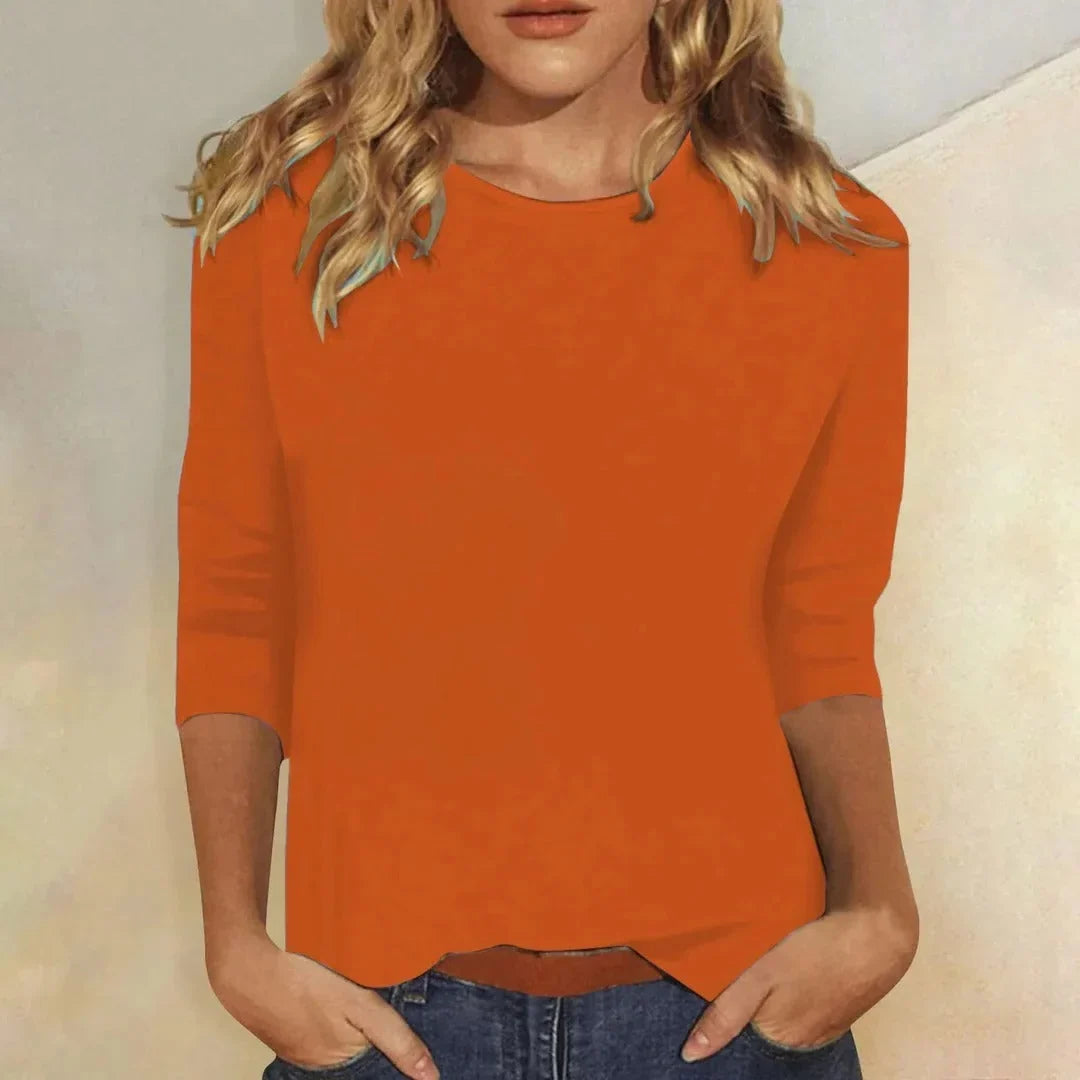 Front view: essential women's casual 3/4 sleeve crew neck top. Comfortable, versatile everyday fashion.