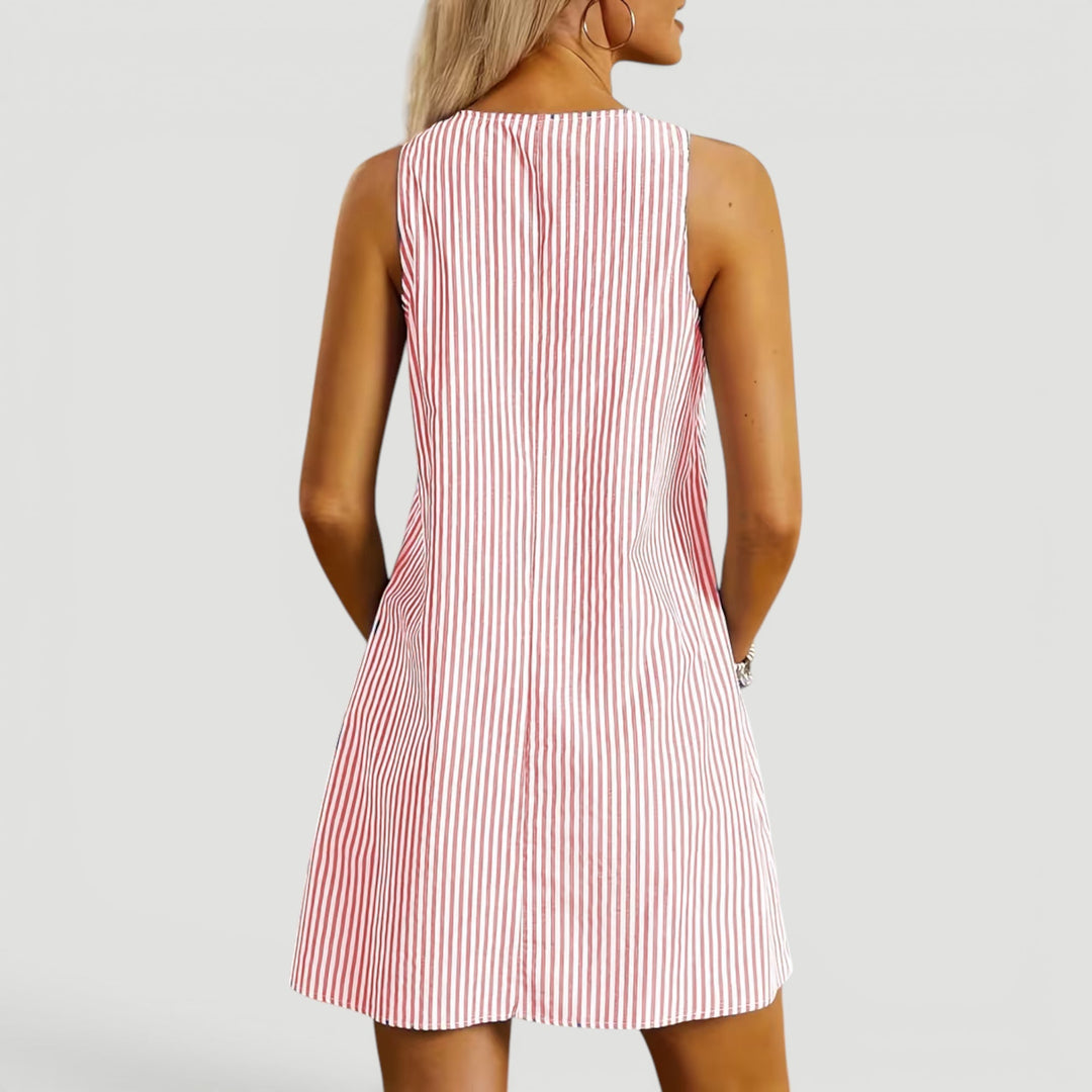 Stylish women's A-line summer dress, knee-length with pockets, great for casual outings.
