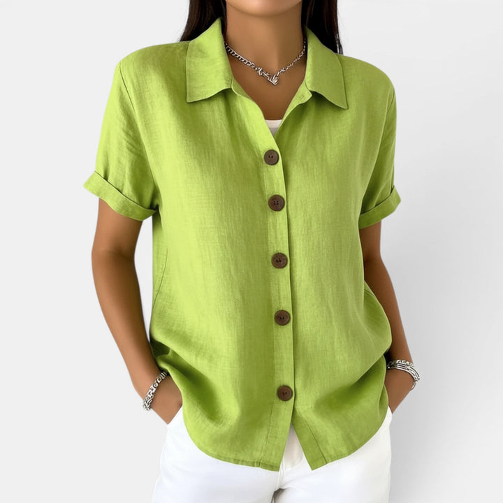 Women's casual button front long sleeve collared blouse in a relaxed fit for effortless everyday wear.