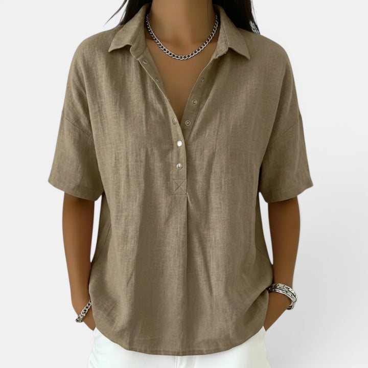 Relaxed fit women's casual top with button front, a versatile collared shirt for smart casual or daily style.