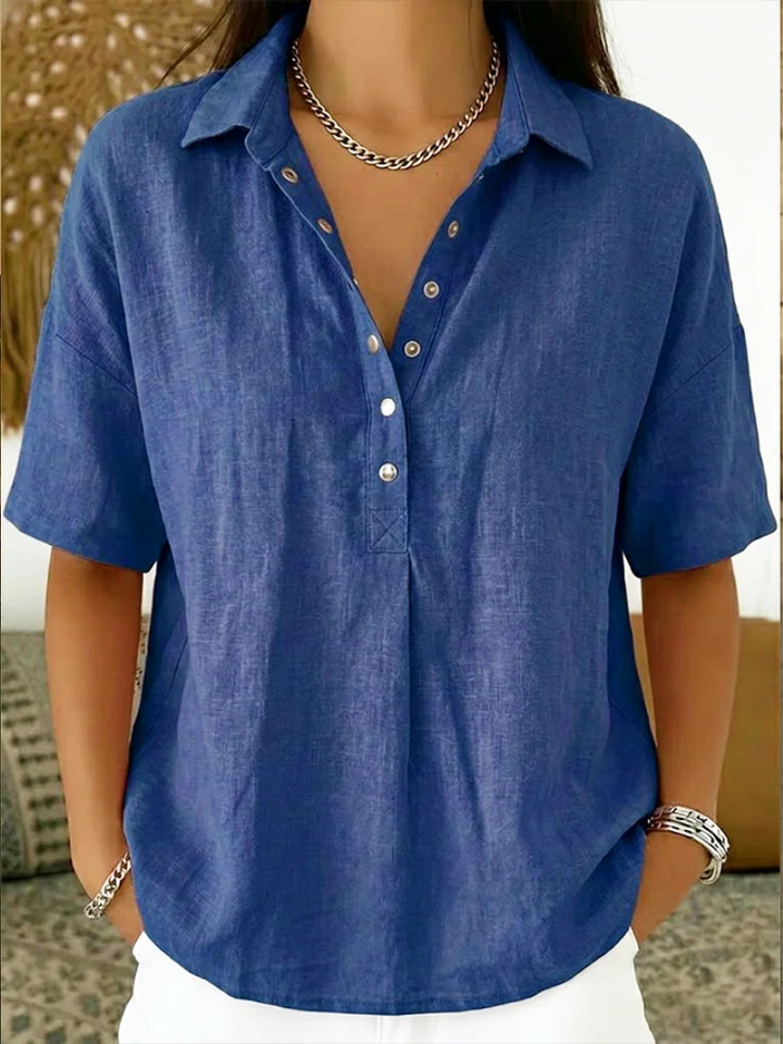 Versatile ladies button-up blouse, ideal for spring outfits or casual summer style, offering a relaxed fit.