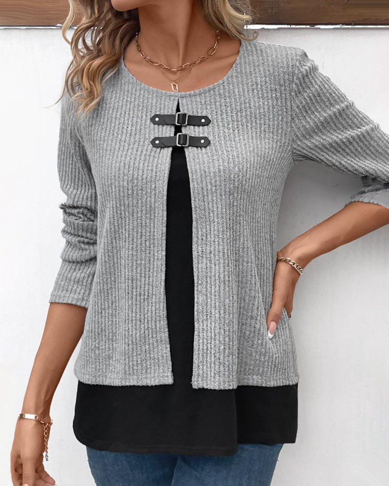 Ladies' round neck long sleeve top featuring trendy color block & intricate patchwork.