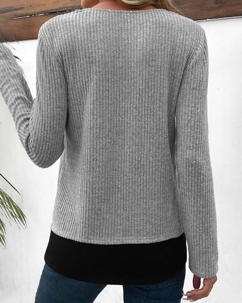 Modern women's color block long sleeve top with elegant patchwork design.