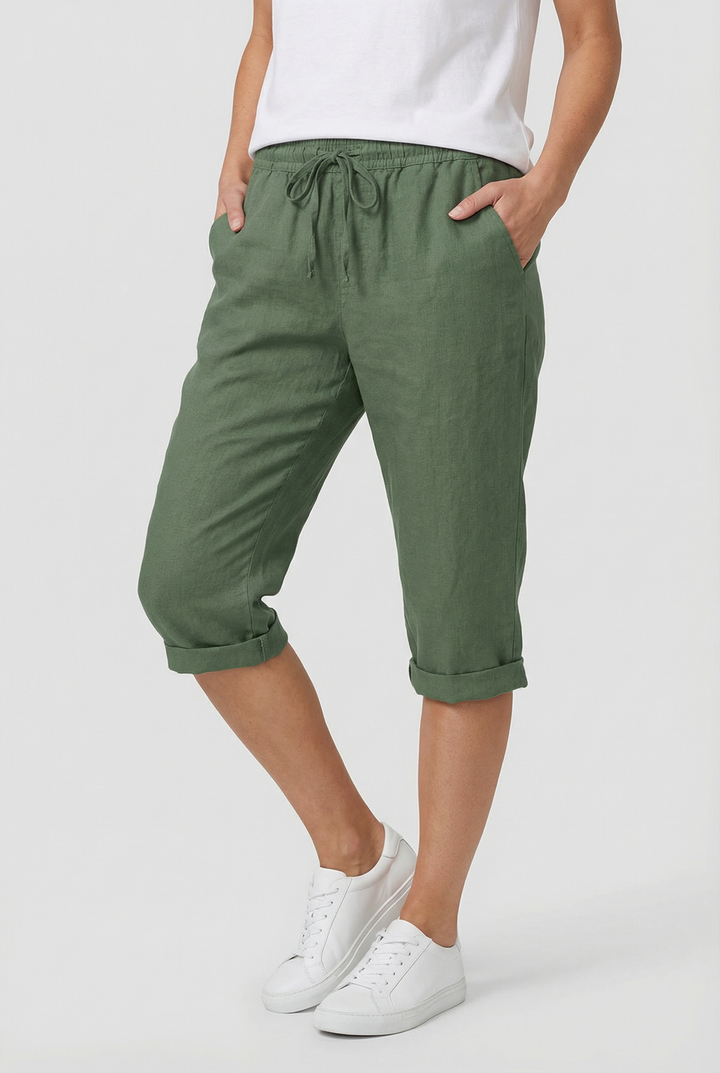 Detail shot of the waistband and pockets on women's breathable summer shorts.