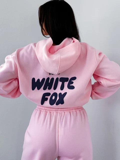 Two-piece women's loungewear set: a cropped hoodie & joggers, perfect for comfort & style, with back print.