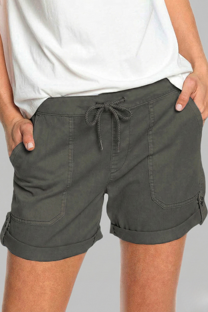 Classic white women's casual drawstring shorts, relaxed fit with pockets for summer comfort.