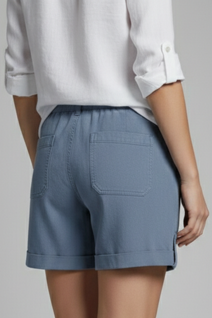 Relaxed fit women's summer shorts with drawstring waist & pockets, essential for warm weather comfort.
