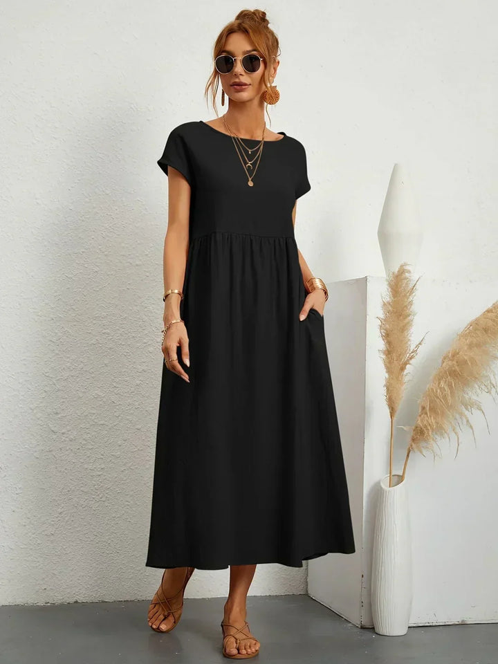 Fashionable women's maxi dress, offering casual comfort and sophisticated long sleeve elegance.