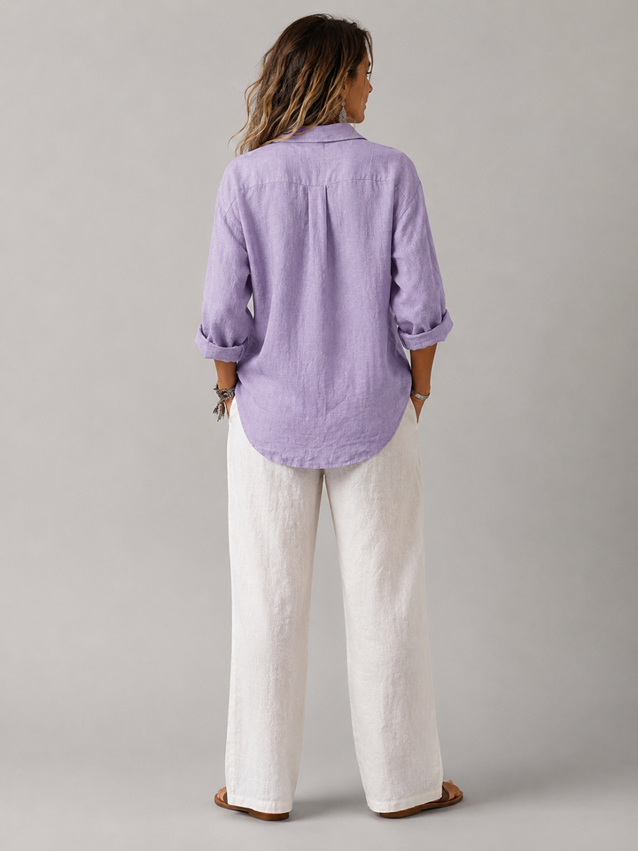 Chic women's button-up blouse with a relaxed fit, ideal for elegant casual spring & summer fashion.