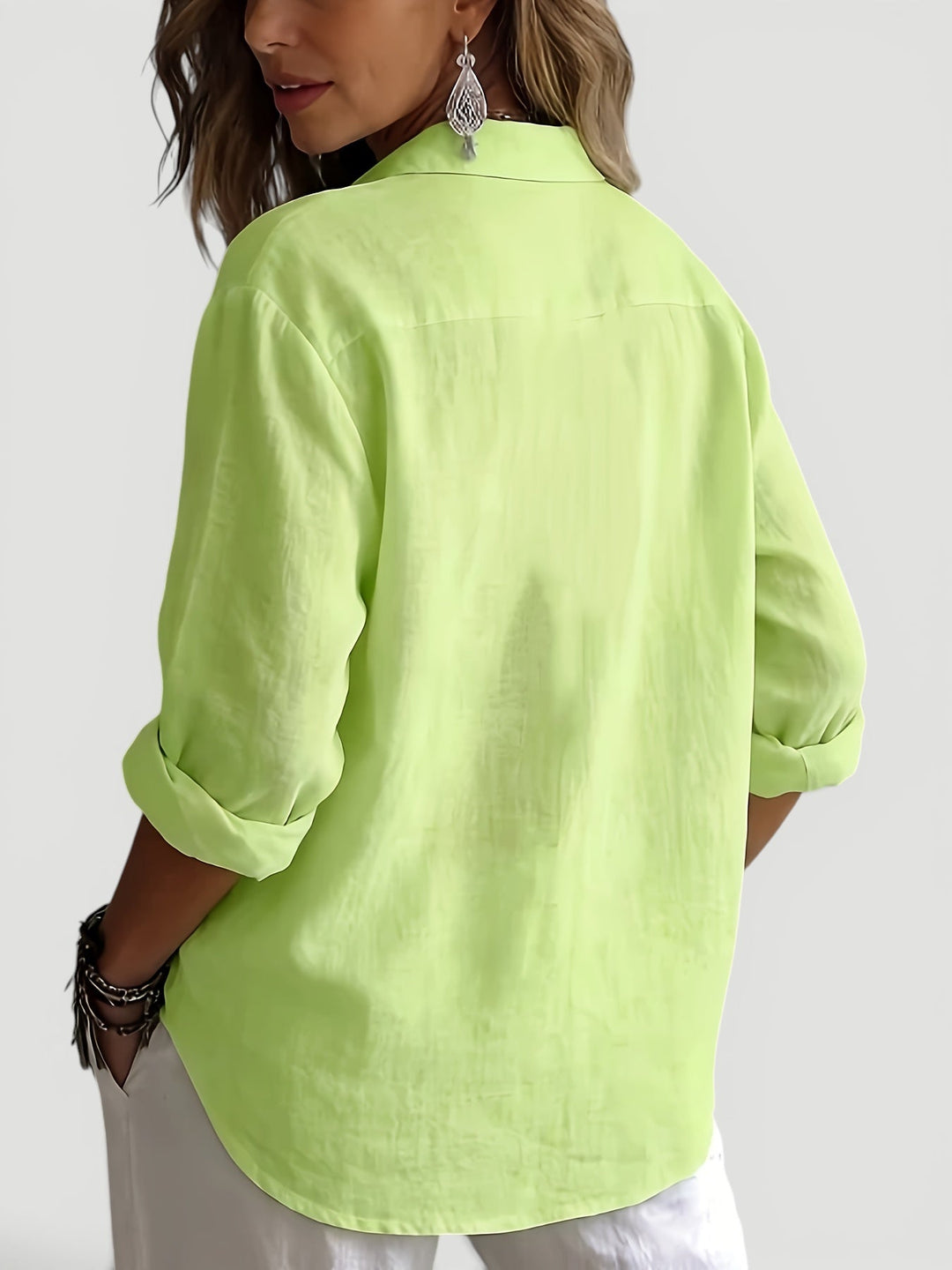 Casual elegant women's blouse, a relaxed fit button-up shirt for sophisticated spring & summer everyday style.