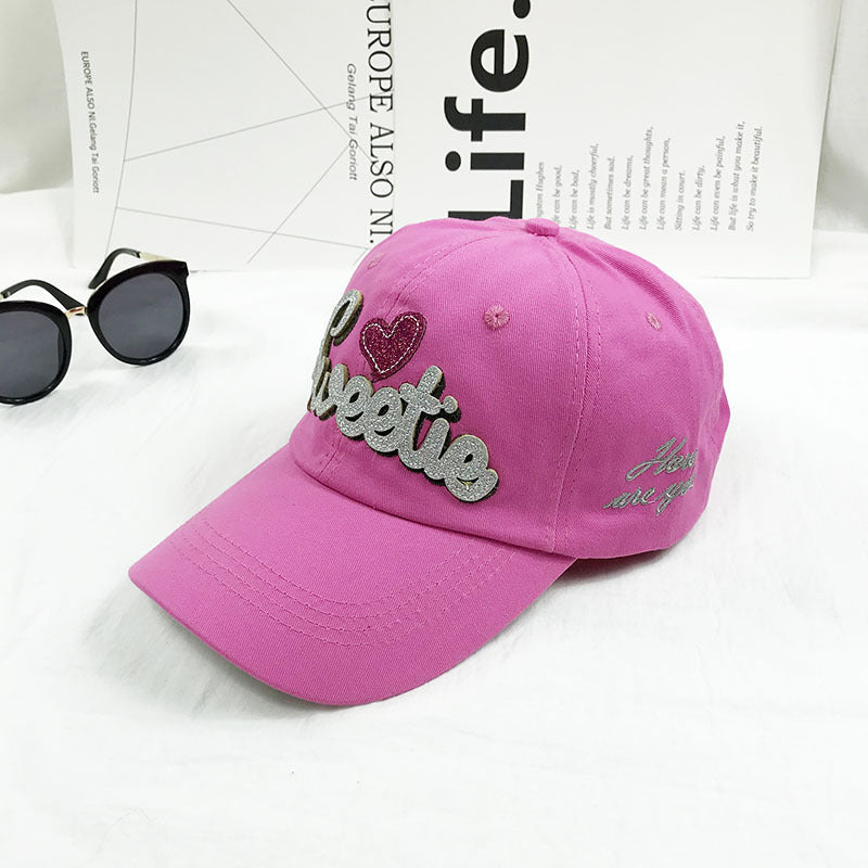 Fashionable women's embroidered cotton cap, adjustable and versatile, a perfect casual hat & sun accessory.