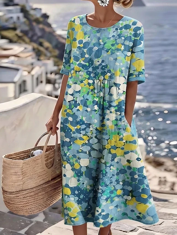 Elegant women's floral print maxi dress, a long flowy bohemian style perfect as a casual summer or vacation dress.